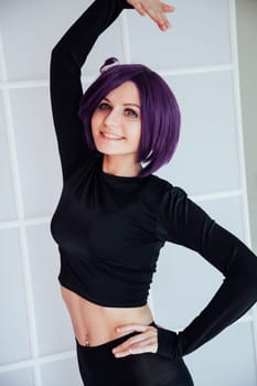 woman anime cosplayer with purple hair