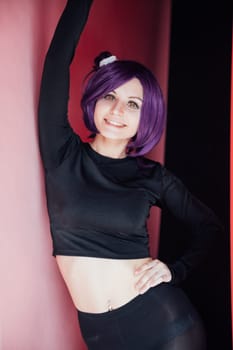 woman anime cosplayer with purple hair