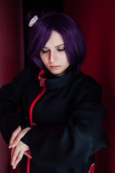 woman anime cosplayer with purple hair