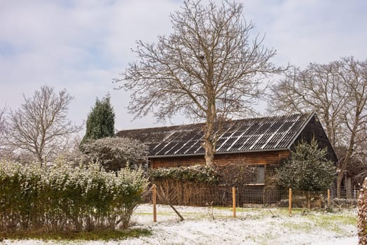 Christmas Tranquility: Winter Wonderland: Snow-Covered European Village Countryside.