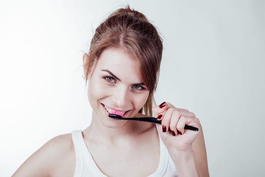 girl cleans teeth toothbrush white smile dentistry