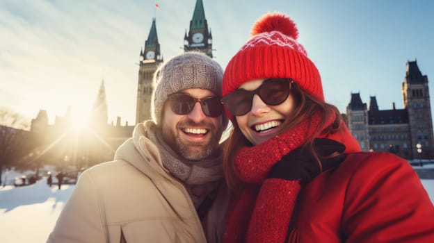 Happy Canadian wearing winter clothes celebrating Christmas holiday at Parliament Hill. People having fun hanging out together walking on city street. Winter holidays and relationship concept.