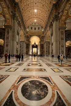 Rome, Italy: 2023 November 14: Inside St. Peter's Basilica, Rome, Italy. St. Peter's Cathedral is the main symbol of Rome and Vatican City. Ornate baroque interior of St. Peter's Church, famous luxury St. Peter's Basilica. Rome.
