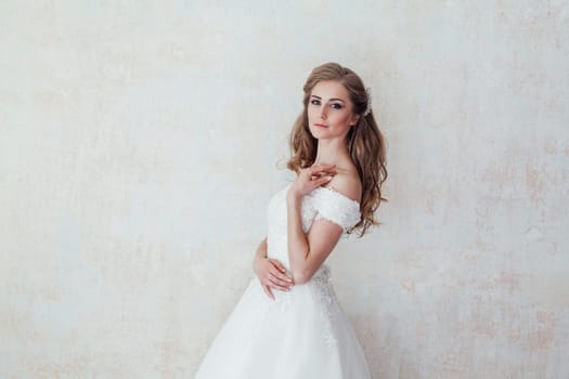 the bride at a wedding in white wedding dress 1