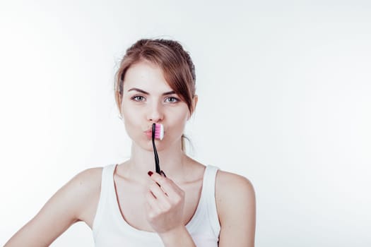 girl with a toothbrush white teeth dentistry