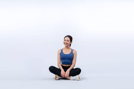 Full body asian woman in sportswear portrait, smiling and posing cheerful gesture. Workout training with attractive girl engage in her pursuit of healthy lifestyle. Isolated background Vigorous