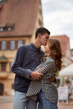 Young Cute Female Hugs Boyfriend. In Autumn Outdoor. Lovers Walking in Park. Attractive Funny Couple. Lovestory in Forest. Man and Woman. Cute Lovers in the Park. Family Concept. Happy Couple.