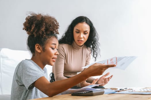 Stressed African American women has financial problems with credit card debt to pay crucial show concept of bad personal money and mortgage pay management crisis.