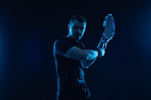 Tennis player with racket. Man athlete playing isolated on background