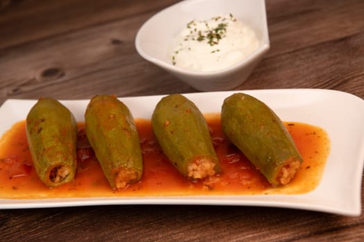 RECIPE FOR LEBANESE-STYLE MINI ZUCCHINI STUFFED WITH RICE AND BEEF IN A TOMATO SAUCE, High quality photo