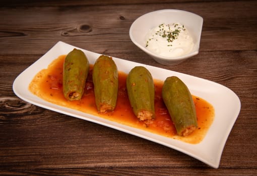 RECIPE FOR LEBANESE-STYLE MINI ZUCCHINI STUFFED WITH RICE AND BEEF IN A TOMATO SAUCE, High quality photo