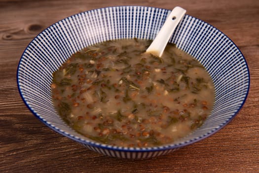 LEBANESE RECIPE FOR CHARD SOUP, LENTILS WITH LEMON, ADAS BI HAMOUD. High quality photo