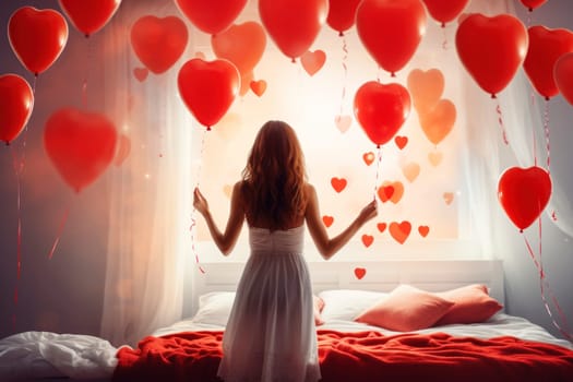 A happy woman enjoys a love-filled moment in a bedroom with heart-shaped balloons