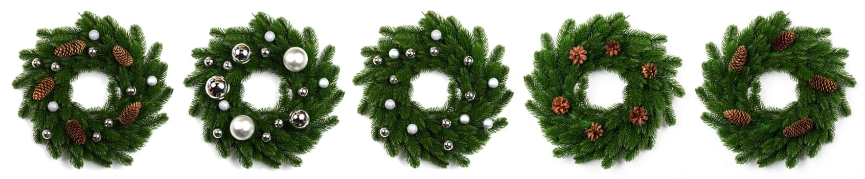 isolated christmas wreath and silver balls on white background
