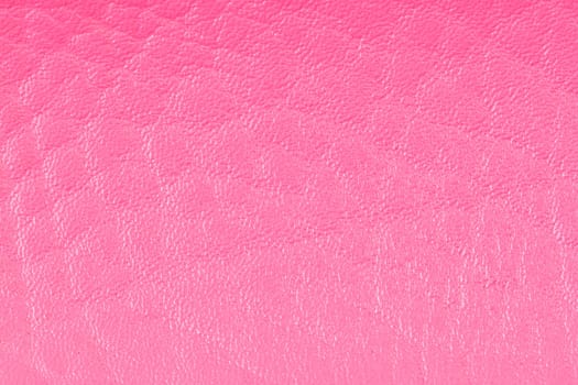 Pink leather texture closeup detailed background.