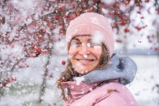 Winter Elegance: Portrait of a Beautiful Girl in a Snowy European Village