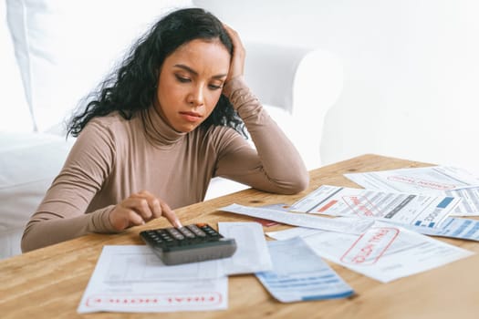 Stressed young woman has financial problems with credit card debt to pay crucial show concept of bad personal money and mortgage pay management crisis. sad and unhappy