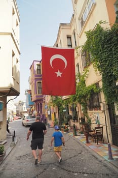 Low Angle View Of Turkish Flag Against Sky