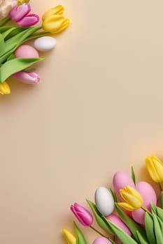 Colorful tulips and eggs lying on teal beige background with copy space for easter celebration
