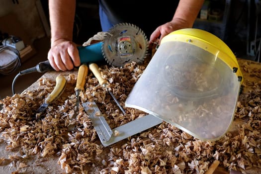 Hand tool on the background of the carpentry workshop. Photo in high quality.