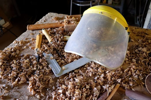 Hand tool on the background of the carpentry workshop. Photo in high quality.