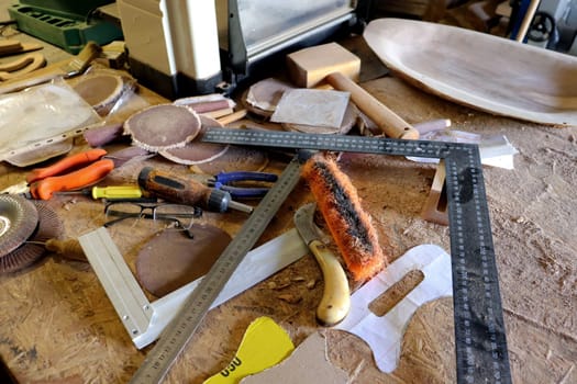 Hand tool on the background of the carpentry workshop. Photo in high quality.