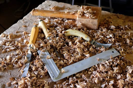 Hand tool on the background of the carpentry workshop. Photo in high quality.