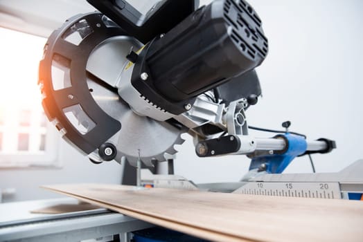 Miter saw closeup, woodwork concept, building and repair