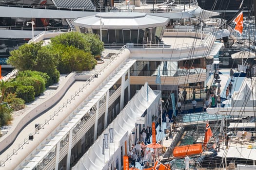 Monaco, Monte Carlo, 27 September 2022 - a lot of luxury yachts at the famous motorboat exhibition in the principality, the most expensive boats for the richest people around the world, yacht brokers. High quality photo