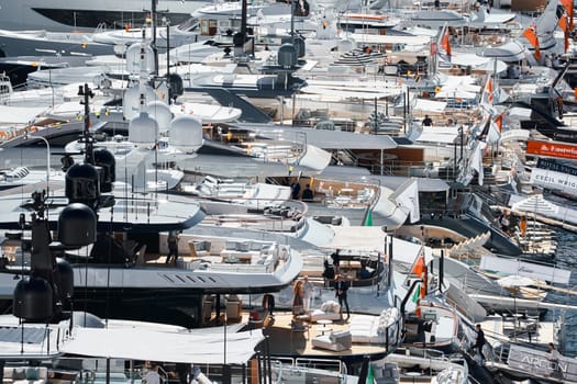 Monaco, Monte Carlo, 27 September 2022 - a lot of luxury yachts at the famous motorboat exhibition in the principality, the most expensive boats for the richest people around the world, yacht brokers. High quality photo