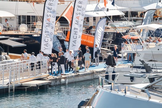 Monaco, Monte Carlo, 27 September 2022 - a lot of luxury yachts at the famous motorboat exhibition in the principality, the most expensive boats for the richest people around the world, yacht brokers. High quality photo