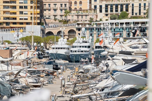 Monaco, Monte Carlo, 27 September 2022 - a lot of luxury yachts at the famous motorboat exhibition in the principality, the most expensive boats for the richest people around the world, yacht brokers. High quality photo