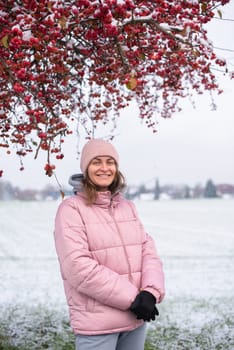 Winter Elegance: Portrait of a Beautiful Girl in a Snowy European Village