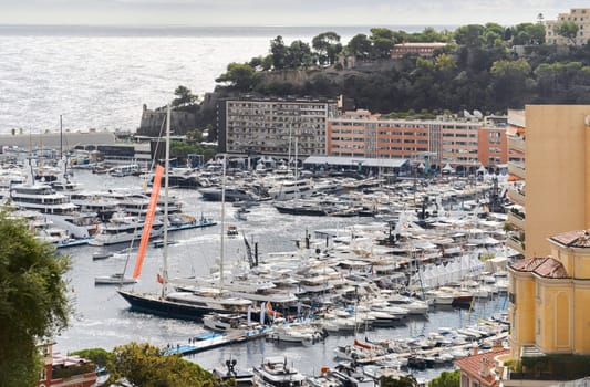 Monaco, Monte Carlo, 27 September 2022 - a lot of luxury yachts at the famous motorboat exhibition in the principality, the most expensive boats for the richest people around the world, yacht brokers. High quality photo
