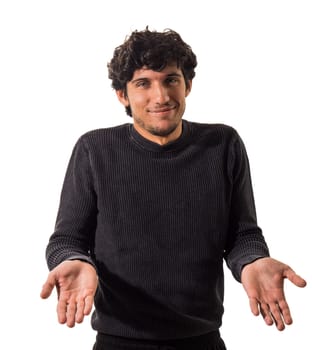A man in a black sweater is holding his hands out, isolated on white background in studio shot