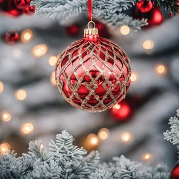 Close-UP of Christmas Tree, Red and Golden Ornaments against a Defocused Lights Background