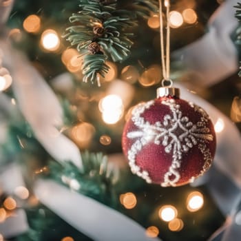 Close-UP of Christmas Tree, Red and Golden Ornaments against a Defocused Lights Background