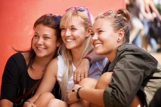 Happy, reunion or friends in music festival on holiday vacation together to relax with smile. Outdoor party, youth culture or excited gen z women in concert for a fun memory or celebration event.