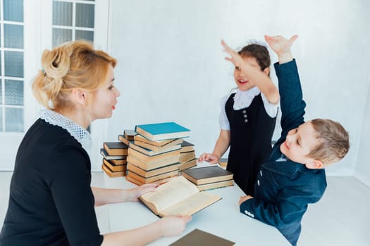 Teacher teaching children in school