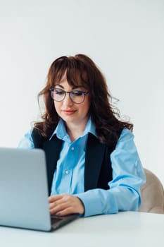 Woman working on laptop in office finance business
