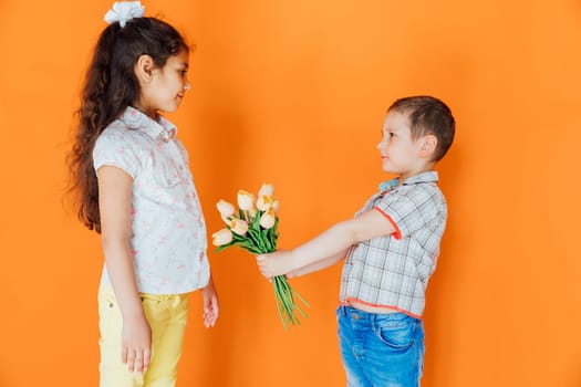 boy giving girl flowers with love