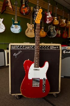 Vintage Red Electric Guitar and Fender Amplifier in Music Shop, Fort Wayne, Indiana