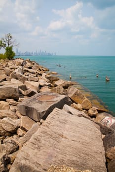 Scenic view of Chicago's rugged shoreline harmoniously blending with the distant urban skyline