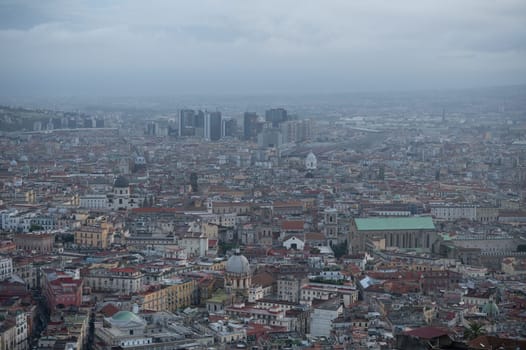 Cityscape of the city of Napoli in the morning with Vesuvius in the background.