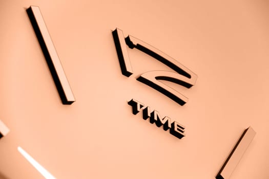 Image with big clocks. Image toned in Peach Fuzz color of the year 2024. New Fashion colour. Top view. Abstract time view. Lost time concept