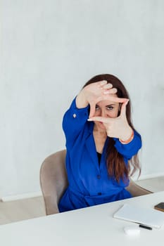 woman made hands rectangle frame and looks