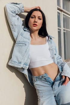 fashionable woman posing on balcony outdoors