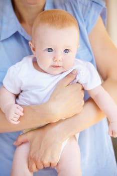 Parents hands, baby or home family support, safety and carry newborn child growth, youth care or maternity. Security, relax and person holding, hug or embrace toddler for bonding, nurture or love.