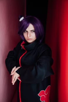 Beautiful woman anime cosplayer with purple hair nindz Japan