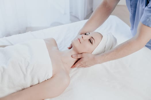 beautiful girl make massage therapy neck in Spa 1